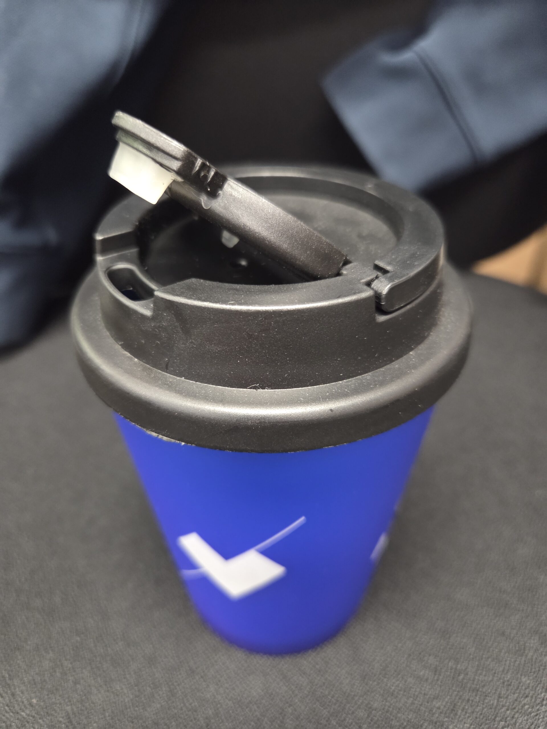 blue cup with lid opened