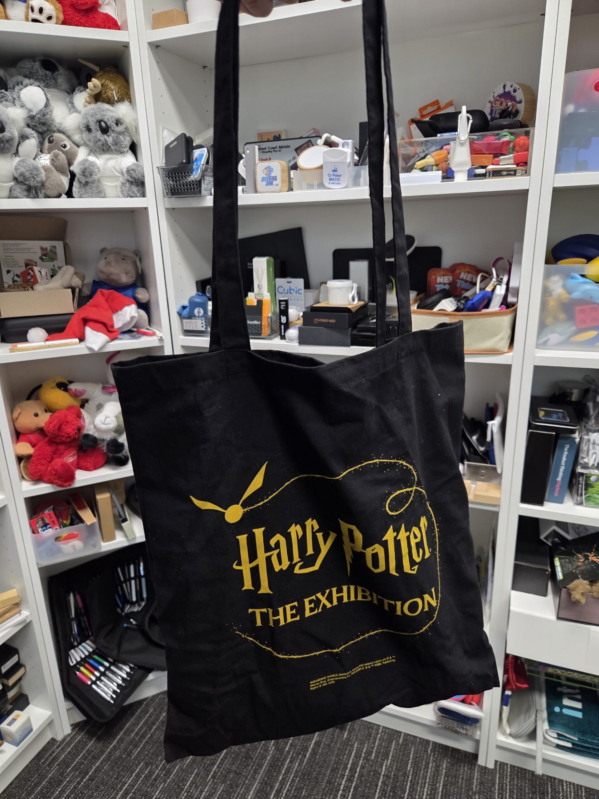 black harry potter tote in a showroom