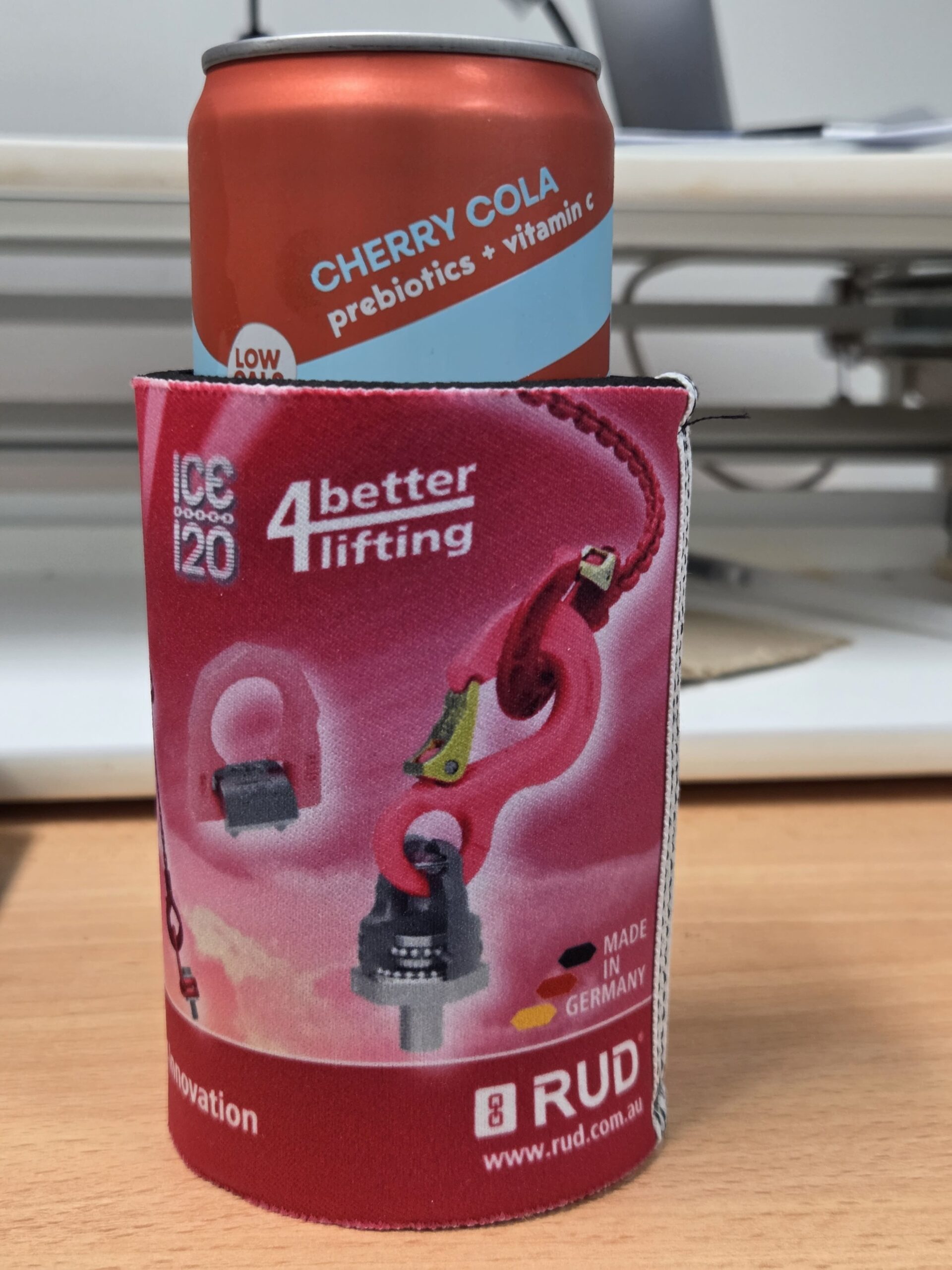 red stubby cooler with a red can for RUD