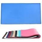 Waterproof Pet Feeding Mats are shown in blue and various other colors, some rolled up.