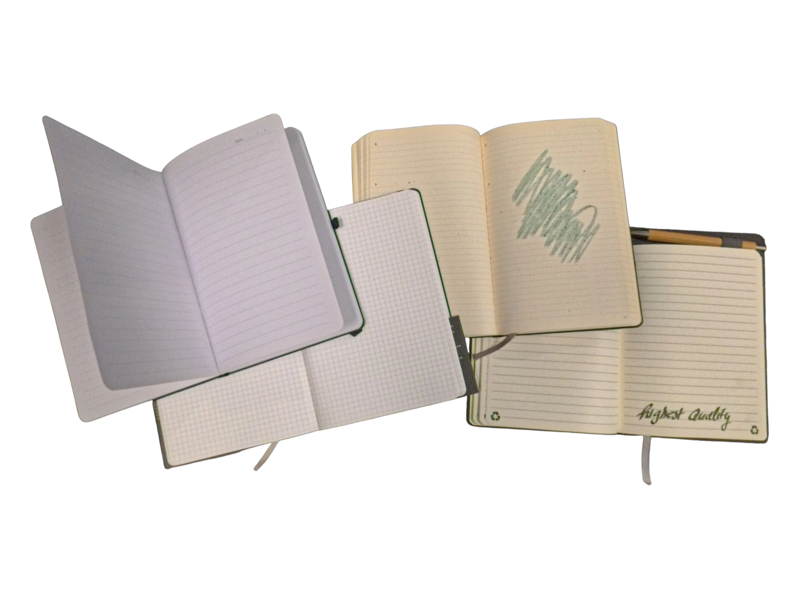 Four open notebooks with lined and grid pages, one scribbled, one labeled highest quality notebooks.