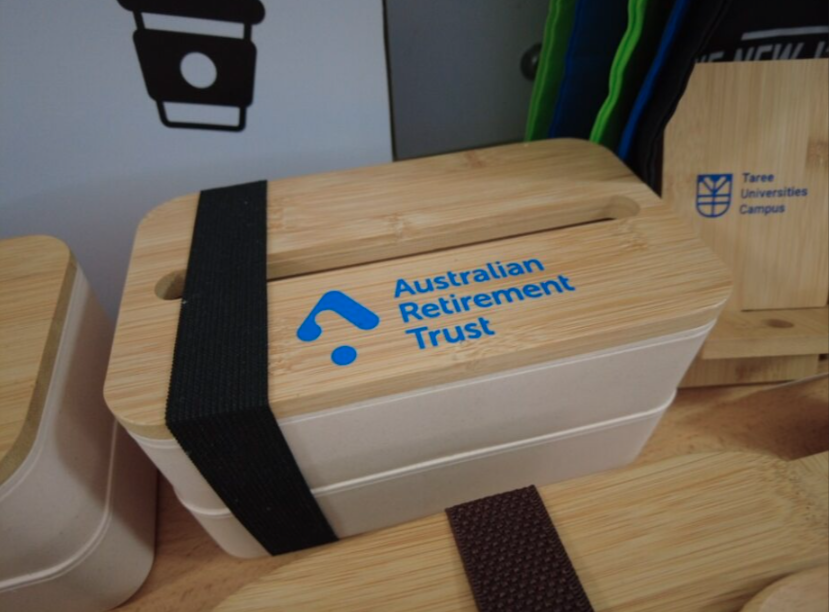 eco friendly lunch box with Australian Retirement Trust logo and black strap