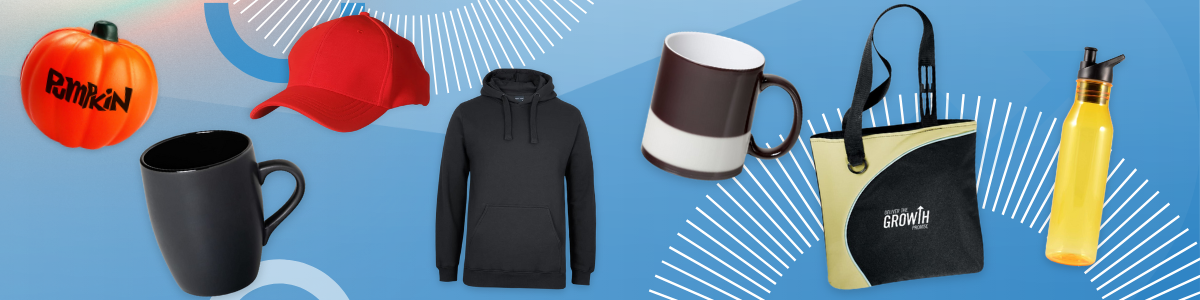 Assorted branded merchandise including a pumpkin, mugs, cap, hoodie, tote bag, and water bottle.