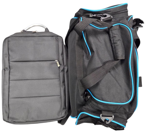 Two black travel bags with blue accents: one upright backpack and one of our duffel bags.