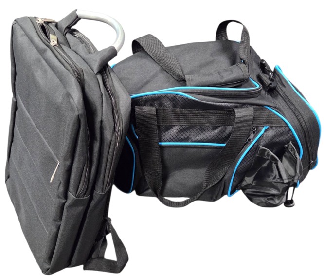Two black duffel bags—one upright with a handle, one with blue accents—perfect for travel.
