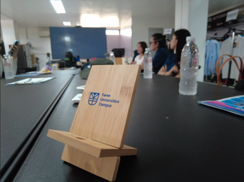 phone stand on a table with logo