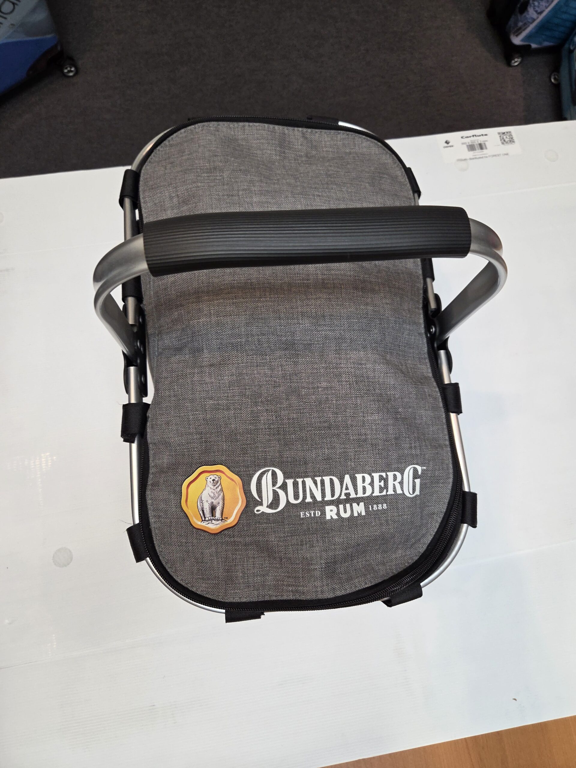 grey picnic basket of Bundaberg Rum with handle