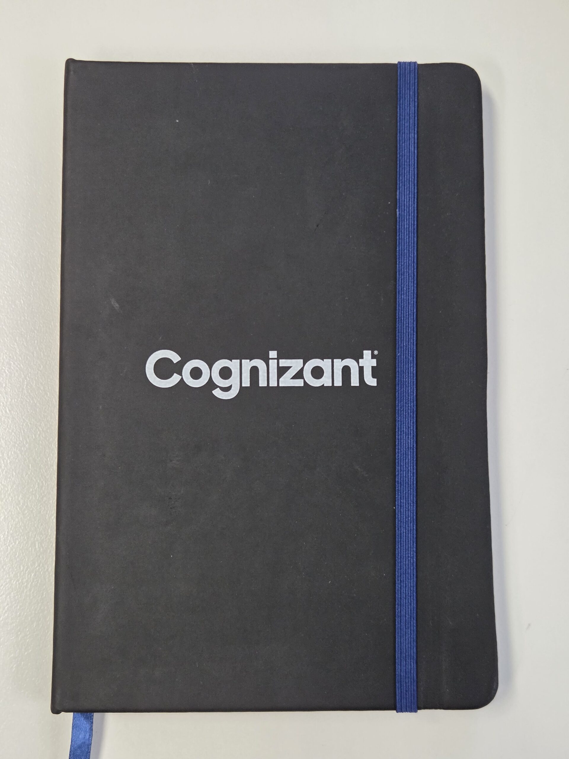 black notebook with blue handle for cognizant