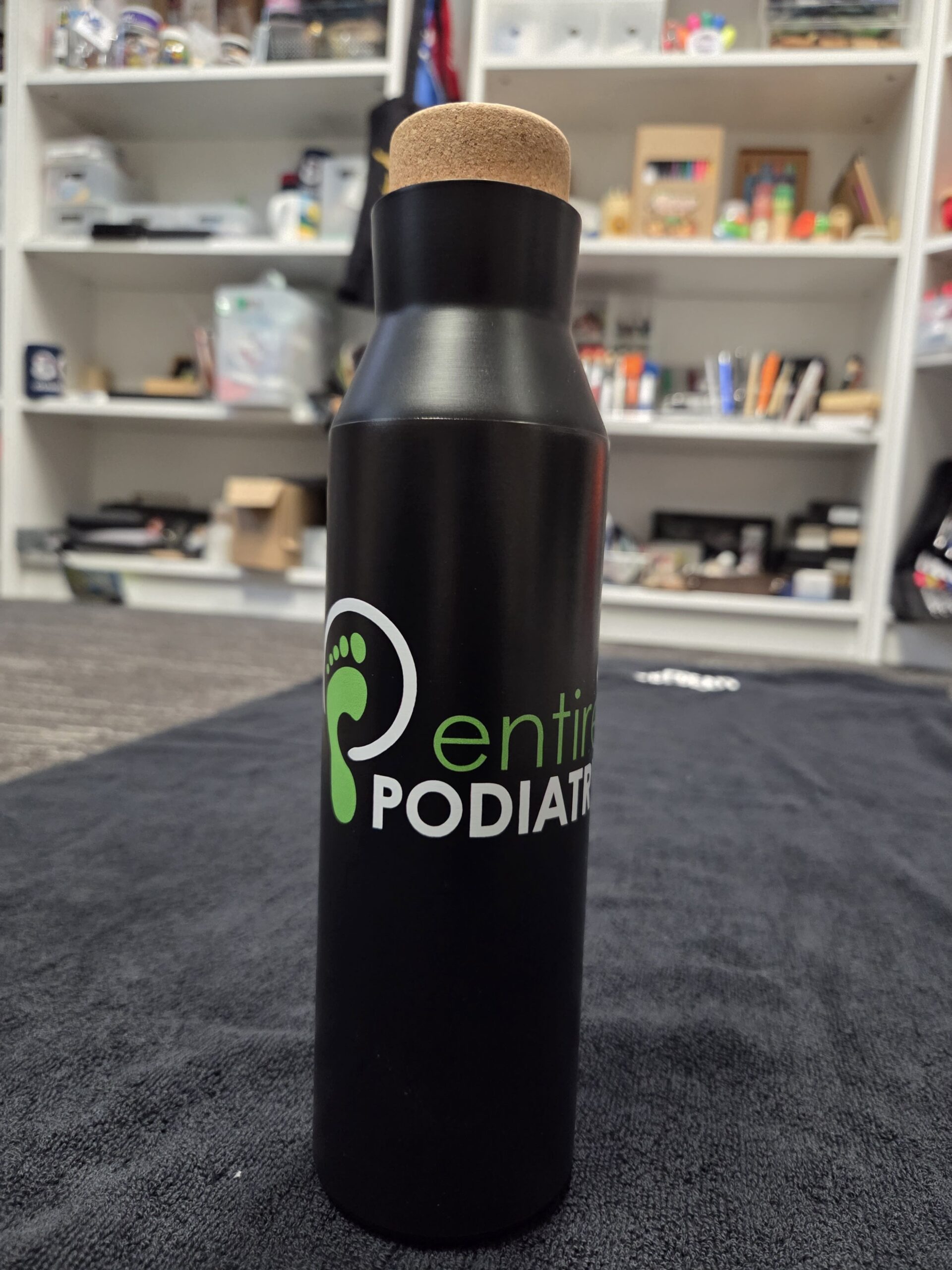 white metal bottle for Entire Podiary