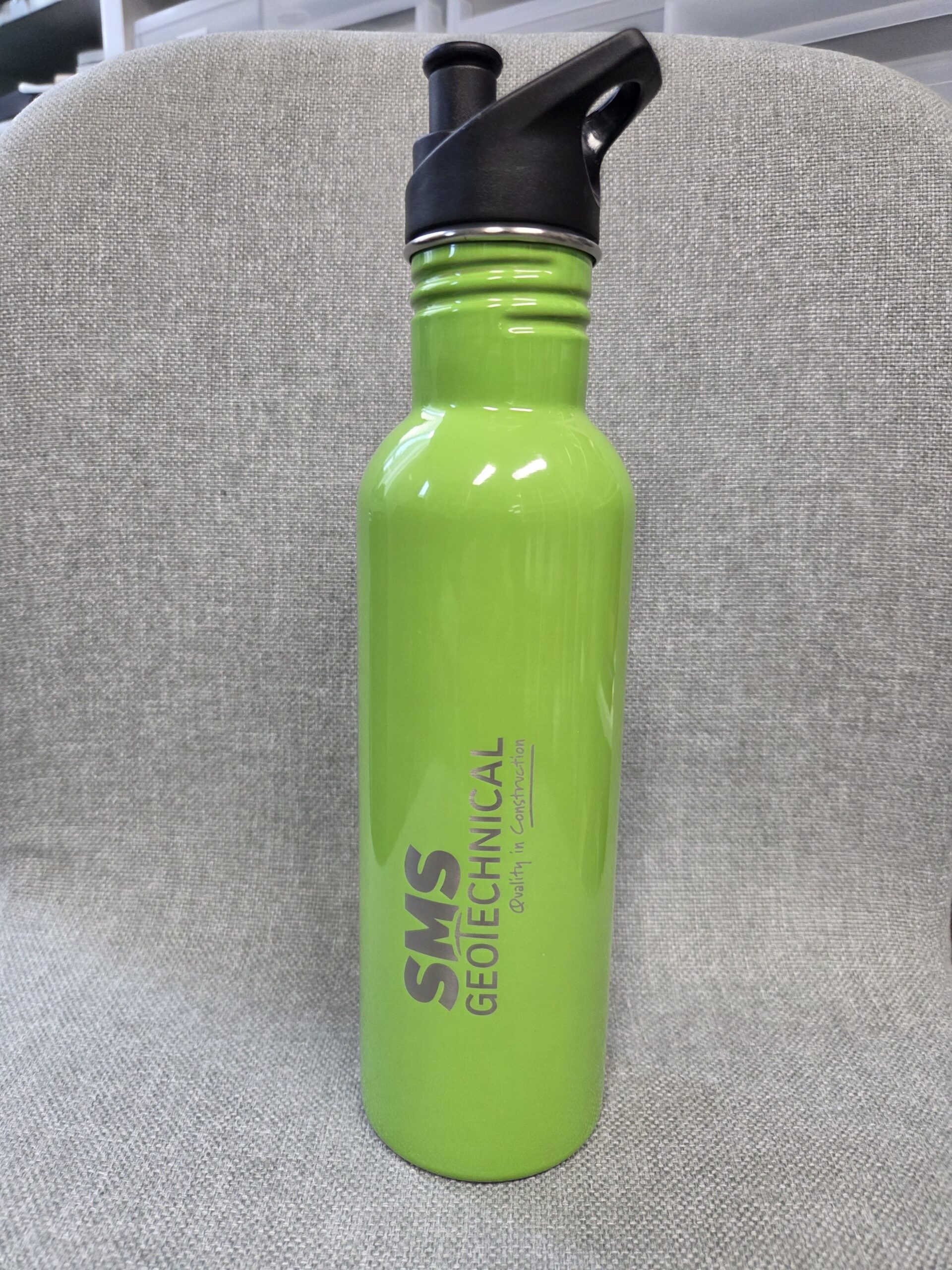 bright neon bottle with SMS Geotechnical logo