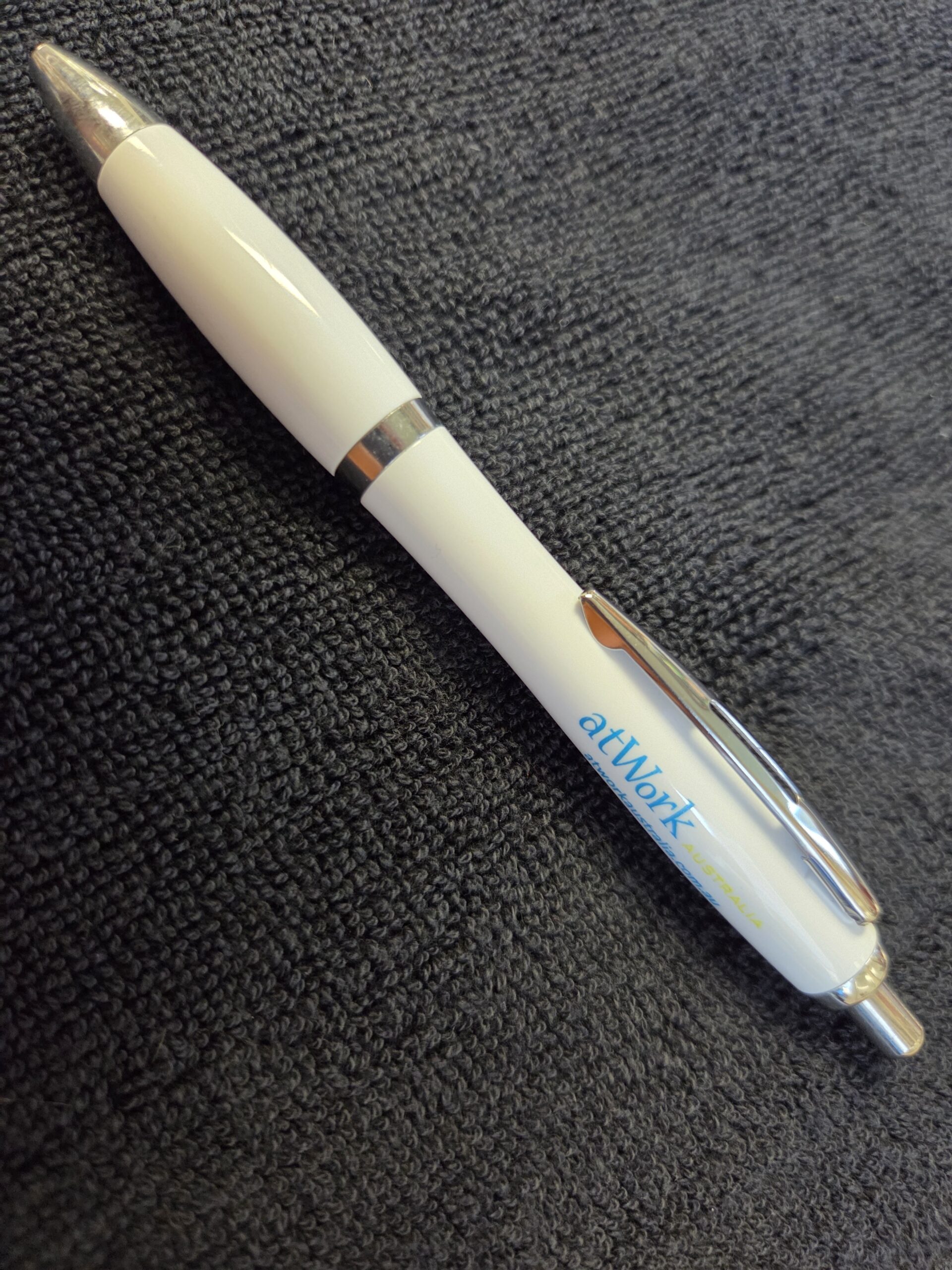 white pens with atWork logo printed