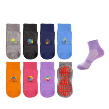 Eight colorful socks with various logos, one purple sock shows a non-slip sole—Happy Client.