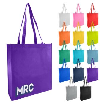 A purple tote bag with MRC from Blum Australia and 14 colorful tote bags arranged in rows.