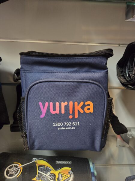 Navy blue insulated lunch bag, ideal for promotional items, with yurika logo and contact details.