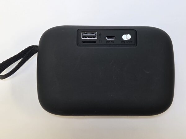 Black portable device with USB ports and on/off switch—great for tech gifts.