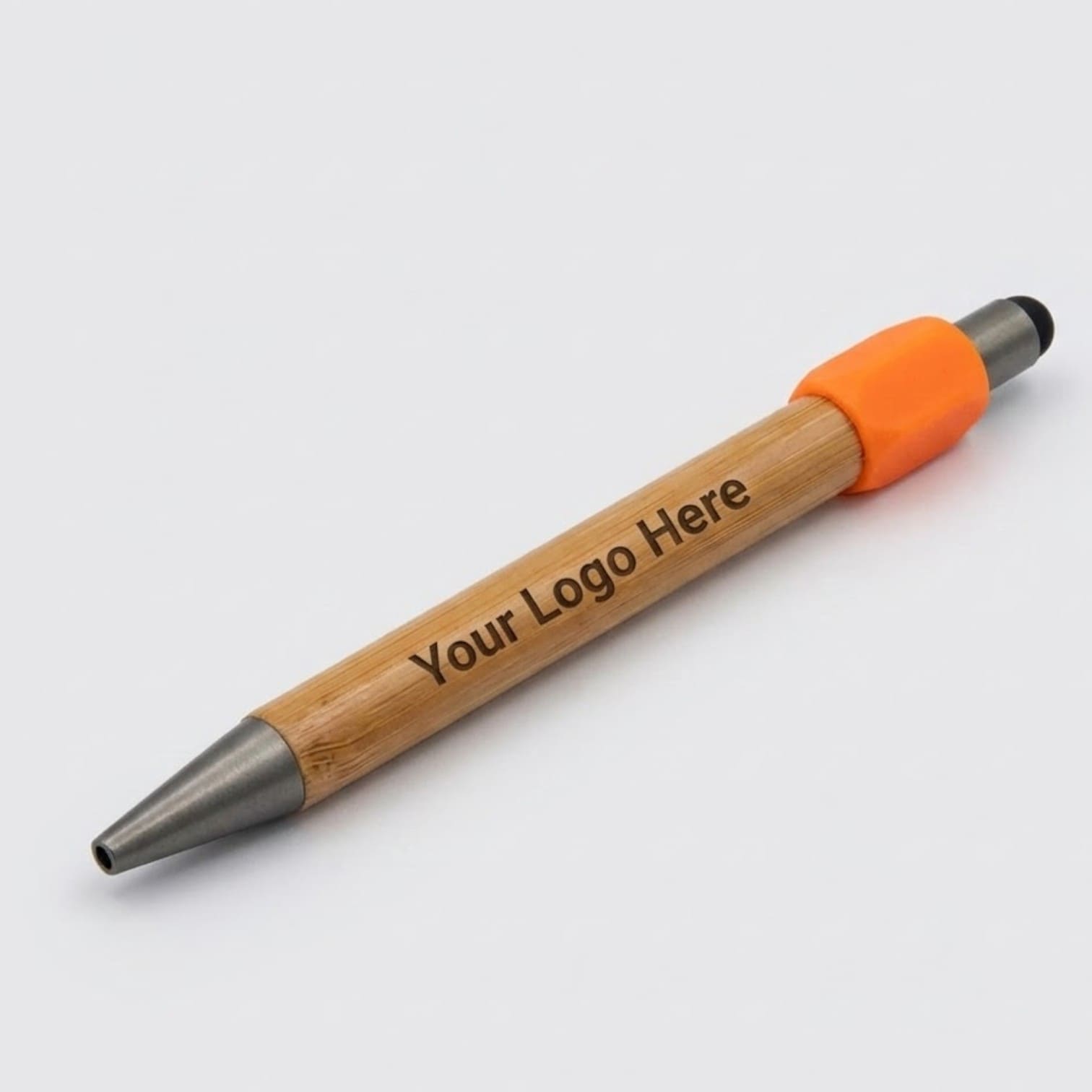 Bamboo pen with orange grip, ideal for promotional items, and Your Logo Here on the barrel.