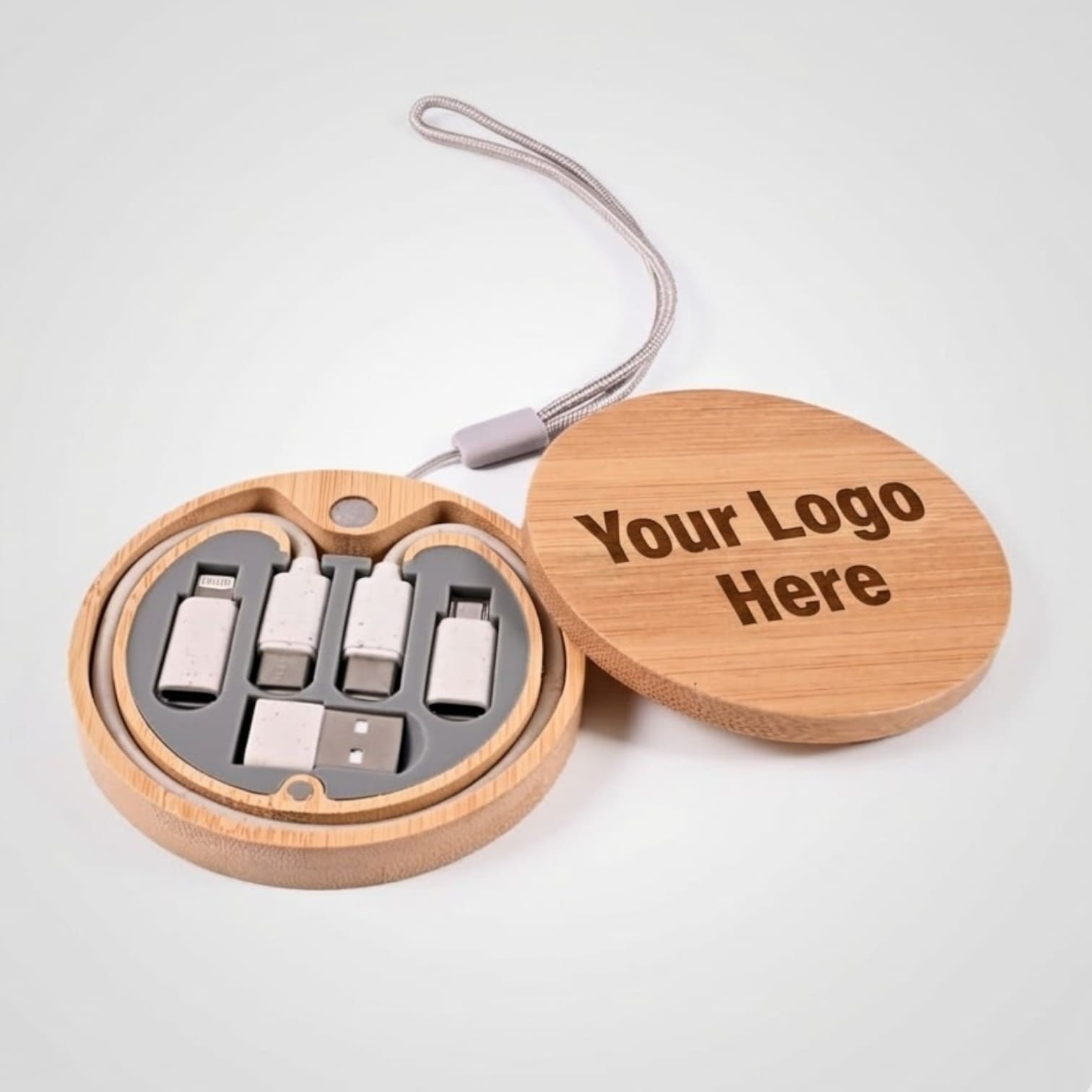Round bamboo case with assorted USB adapters—perfect promotional items with your logo on the lid.