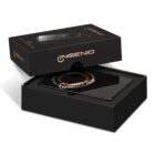 A sleek black device in a partially opened Ingenio branded black box.