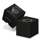 Black box packaging for INGENIO Arc wireless car charger, with charger partly visible inside.