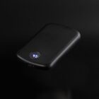 A black power bank with a digital display reading 47% on a black background.