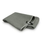 Gray folded towel with a waffle texture and a black carabiner attached to one corner.