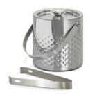 Silver metal ice bucket with lid and handle, next to matching metal ice tongs.