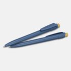 Two blue retractable pens with yellow click buttons lying on a white surface.
