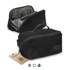 Two black toiletry bags, one open showing compartments, with a tag and three icons below.