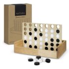 Wooden Connect Four game set with black and white pieces, box in the background.
