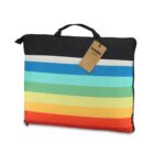 A colorful striped bag with a handle and a brown tag attached.