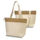 Two beige canvas tote bags with brown trim and long handles, standing upright.