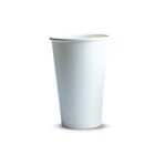 A plain white paper cup standing on a white surface.