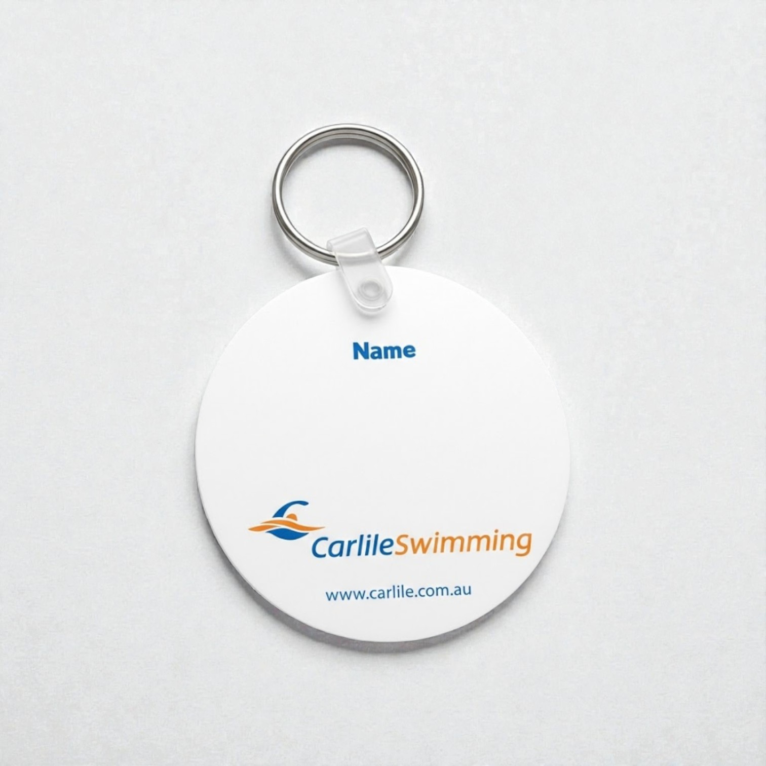 Round key tag, perfect for real estate welcome packs, with Name, logo, and www.carlile.com.au.