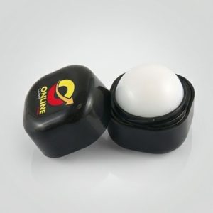 Small black container of ONNINE lip balm, lid beside it showing the ONNINE logo.
