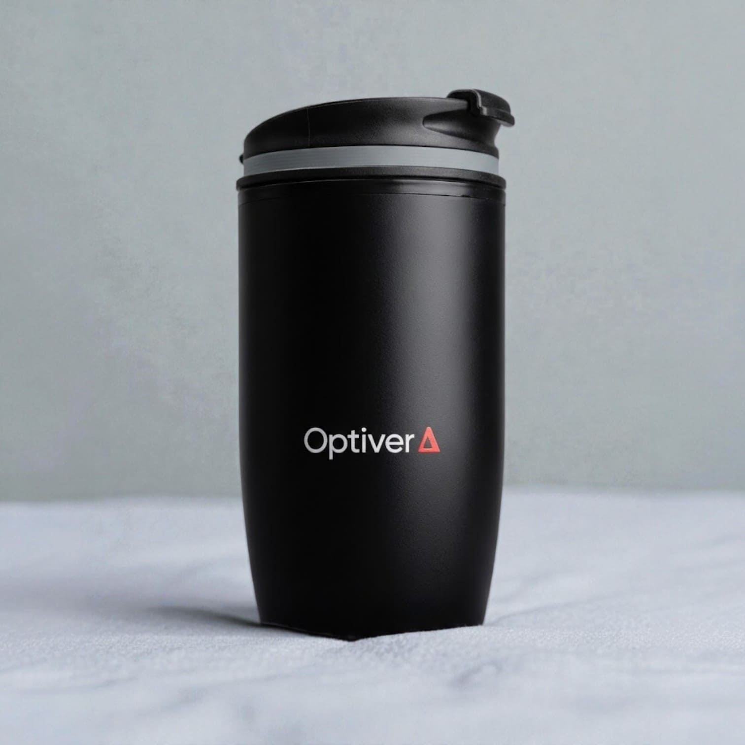 Black travel mug with Optiver logo—ideal promotional product for accounting firms in Australia.