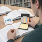 Using Mini Pocket Sticky Pad Sets to mark pages in books and notes at the library.