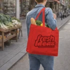 Person carrying a Red White Blue Black Tote Bag at an outdoor market.