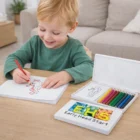Smiling child colors a seahorse using Kids Pasadena Colouring Sets at the table.