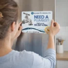 Woman placing a 17 x 11.5cm Rectangle Fridge Magnet on a refrigerator.