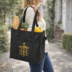 Woman carrying a Shopper Organiser Branded Tote Bag filled with groceries.