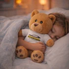 Child sleeps, hugging a 20Cm Soft Bear in an AUTODRIVE.COM t-shirt.