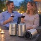 Smiling couple drinks wine outdoors with Accessible Custom Branded Auto Bottle Openers on table.