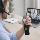 Man on video call holding a Funky Stress Balls Hammer with "Your Logo Here" text.