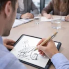 Sketching a solar panel and battery in a meeting with Bambooflair Stylus Pens.