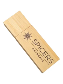 Wooden USB drive with Spicers Retreats logo, star emblem, and usb preloading option.