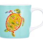 A turquoise mug with a colorful sea turtle illustration on the side.