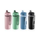 Four reusable water bottles in pink, green, blue, and black with flip-top lids.