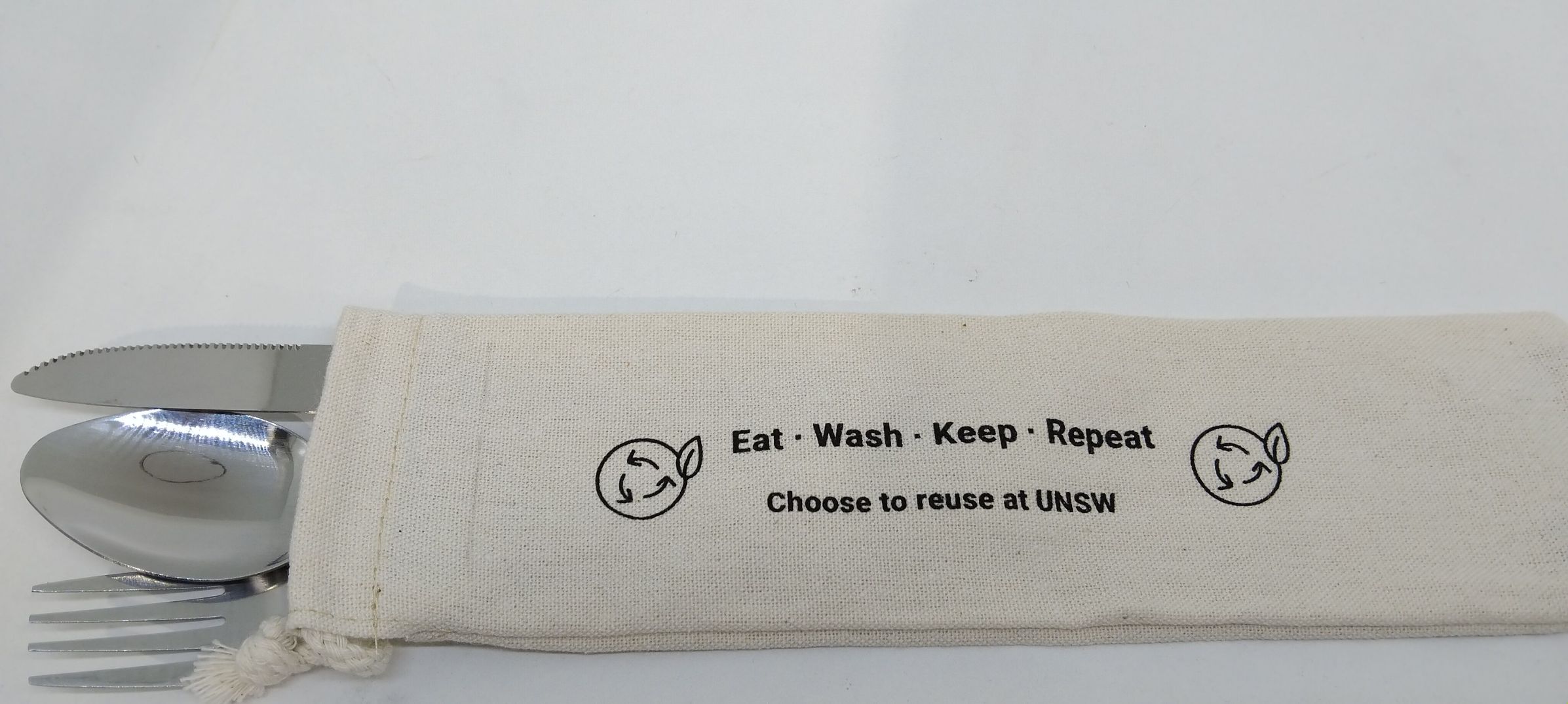 Reusable UNSW cutlery set in a pouch—Eat · Wash · Keep · Repeat. Choose to reuse at UNSW.