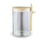 Clear glass jar with a wooden lid and matching spoon attached to the side.