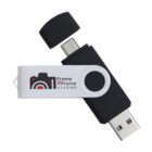 A USB flash drive with dual connectors and a camera logo reading Frame by Frame Studios.